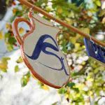 Ladenschild mit ASt-Logo